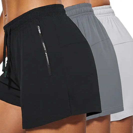 One Pack Contains 3 Women’S Casual Athletic Shorts — Solid Color; Suitable for Outdoor Sports, Fitness, Running, Yoga, the Beach, and Everyday Casual Wear; Features Zippered Pockets.